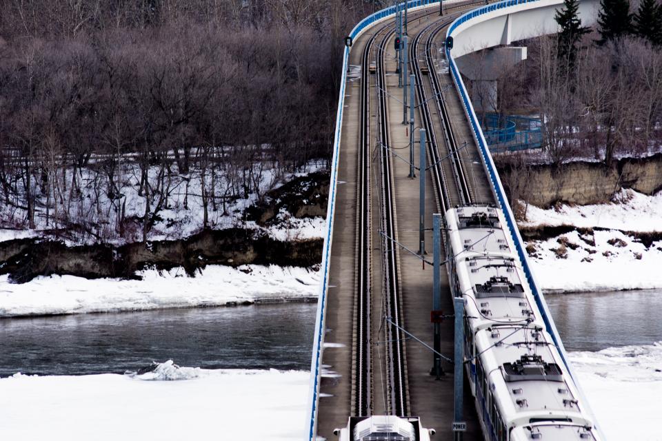 winter water transportation train tracks snow river railway railroad 