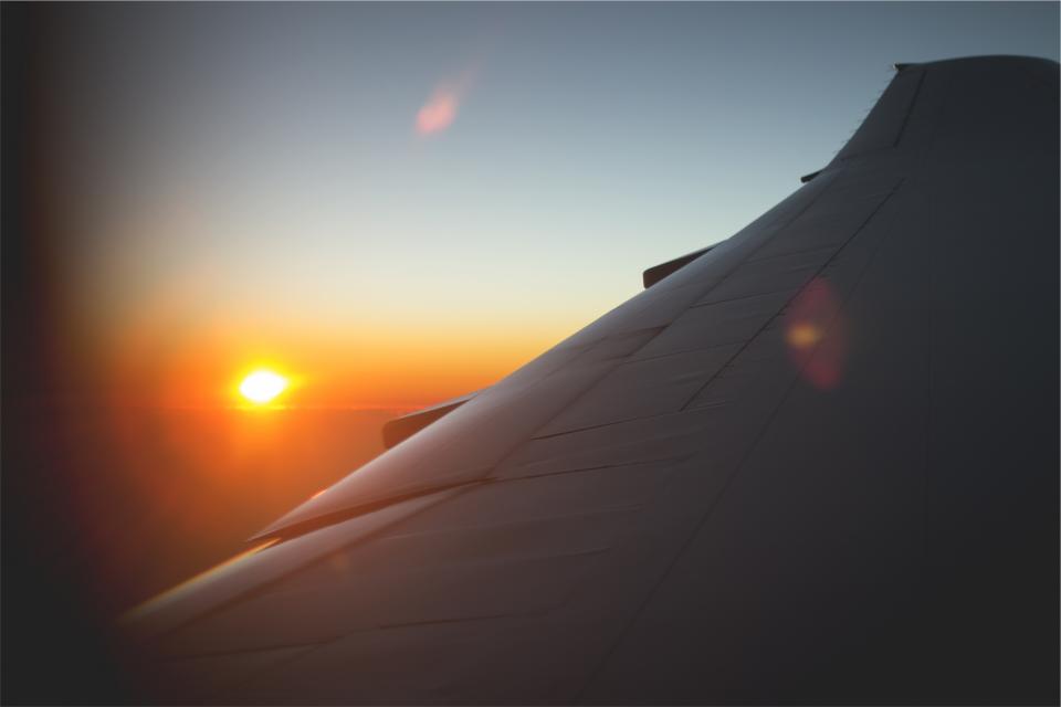 wing trip travel transportation sunset sky airplane 