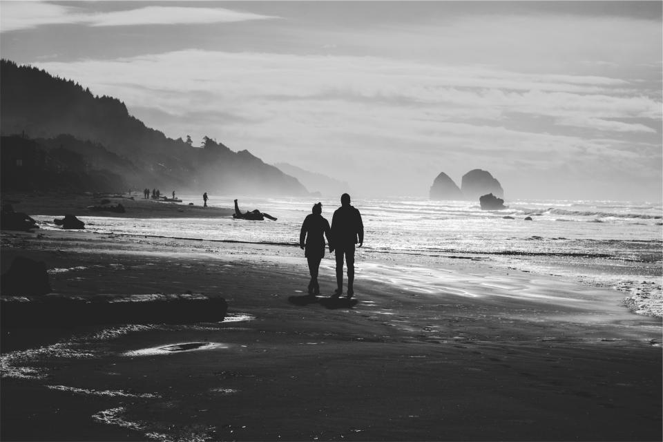 waves shore sea sand romantic romance people ocean love holdinghands couple blackandwhite beach 