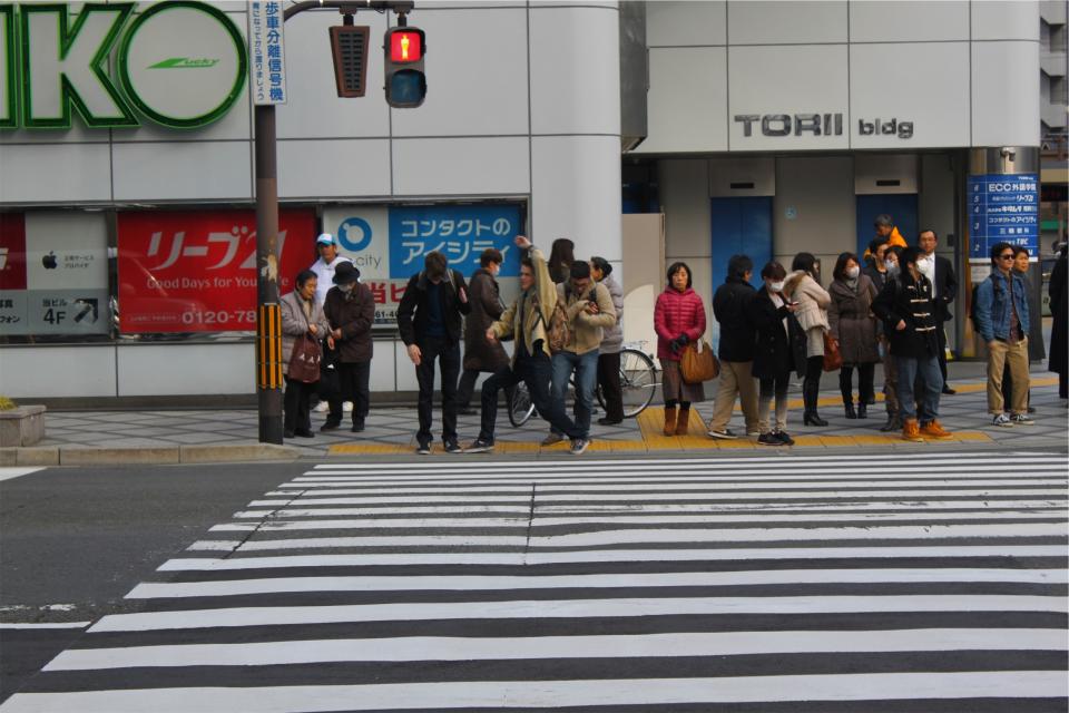 urban street people pedestrians crosswalk city asia 