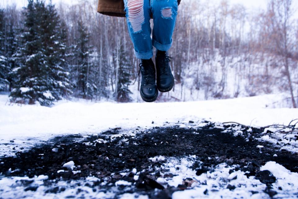 winter snow rippedjeans outdoors jumping jump ground denim boots 