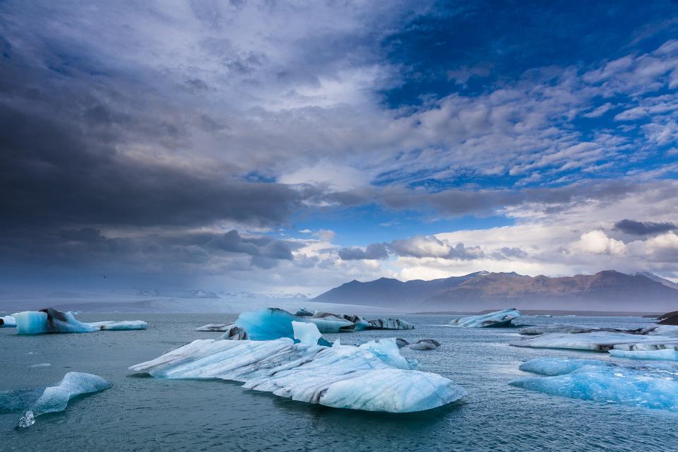water sky lake iceland ice glaciers clouds 
