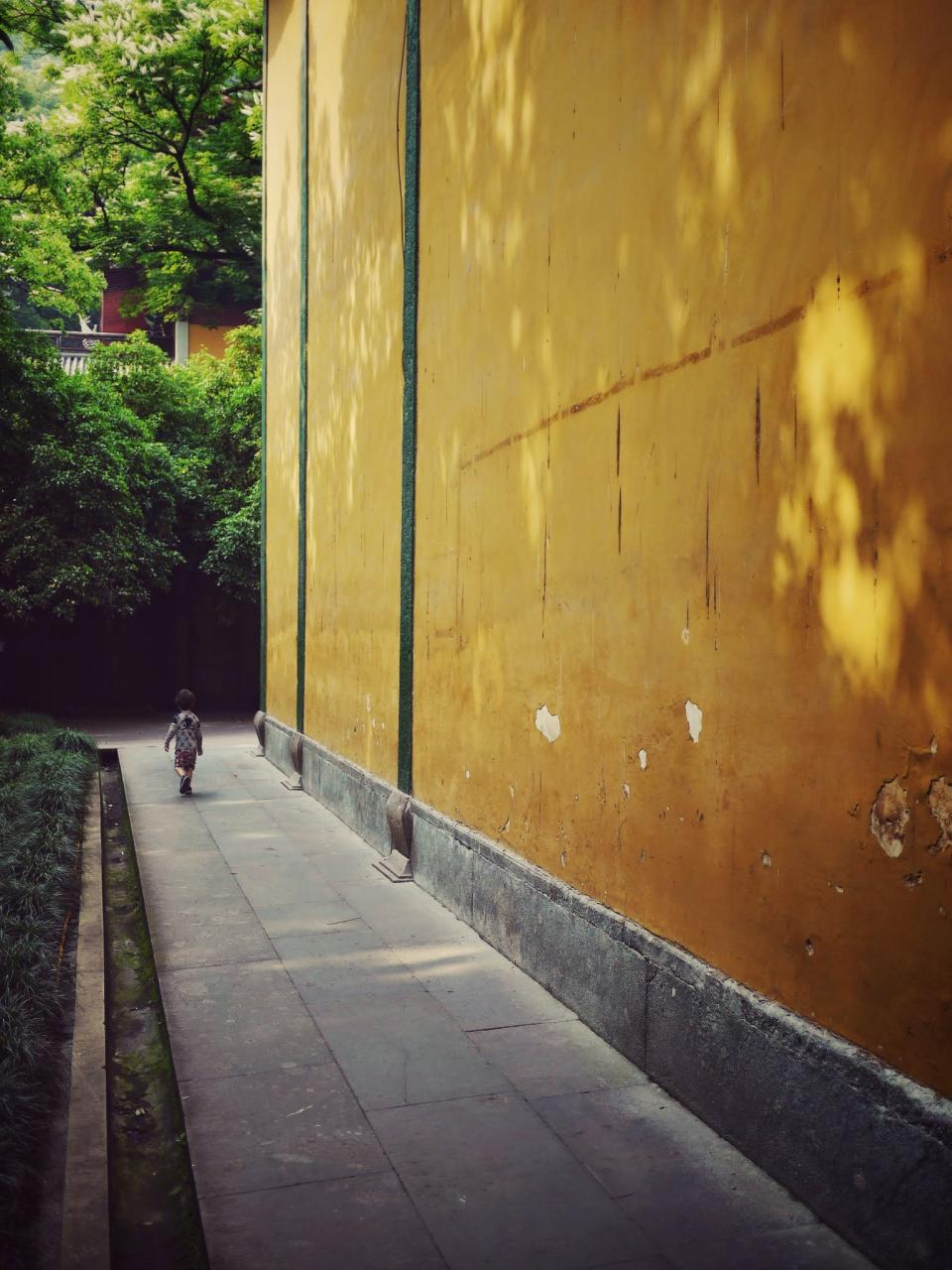yellow wall walk temple china baoy 