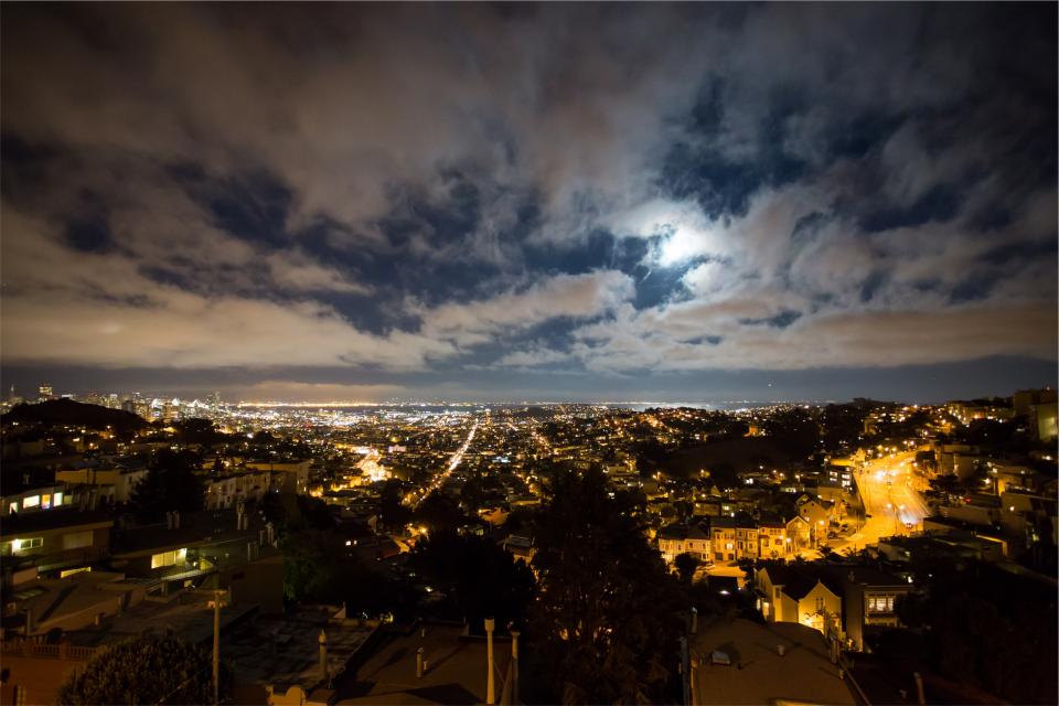 view sky night lights houses evening clouds city aerial 