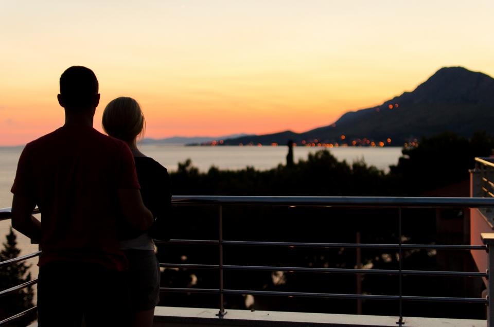 sunset silhouette romantic romance people love dusk couple balcony 