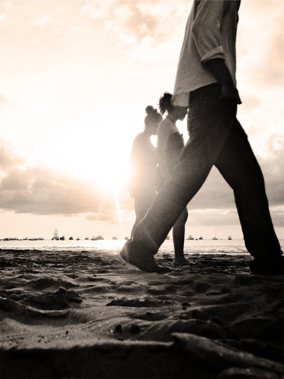 walking sunset sand people beach 