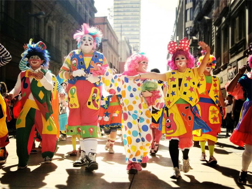 people parade clowns 