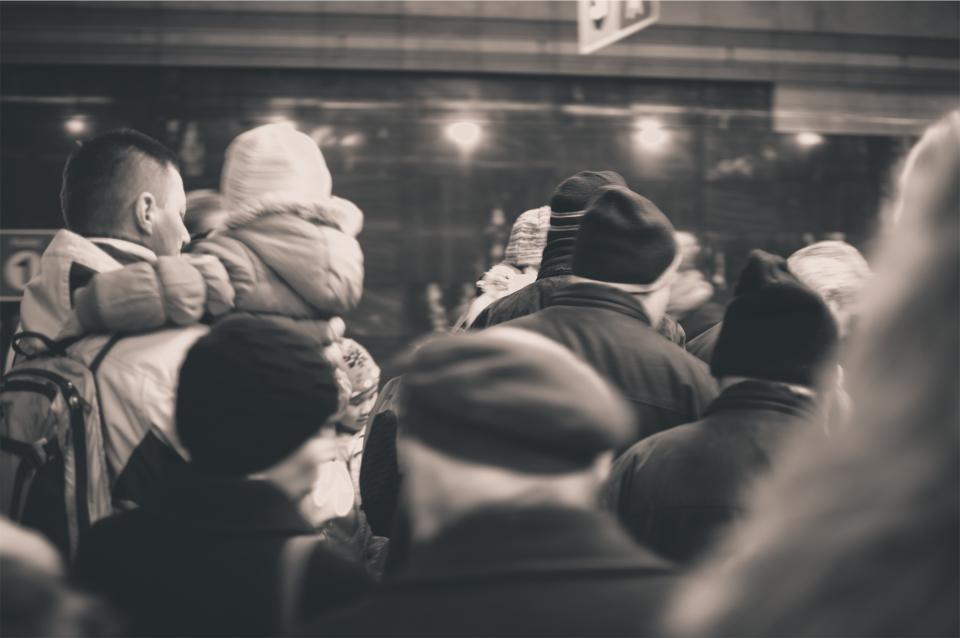 winter transportation subway people hats crowd coats busy 