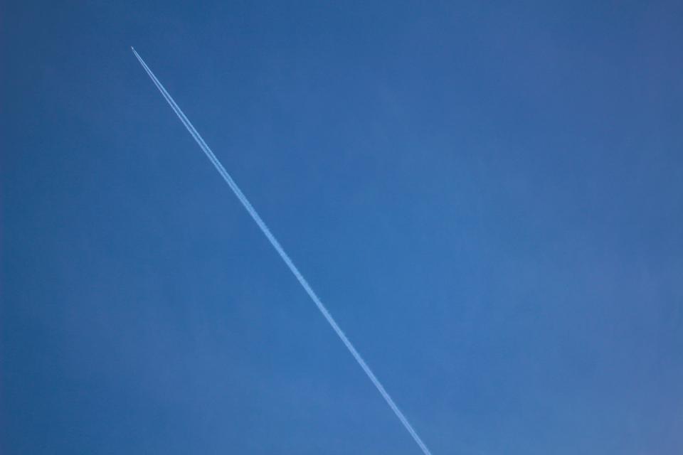 sky contrails blue airplane 