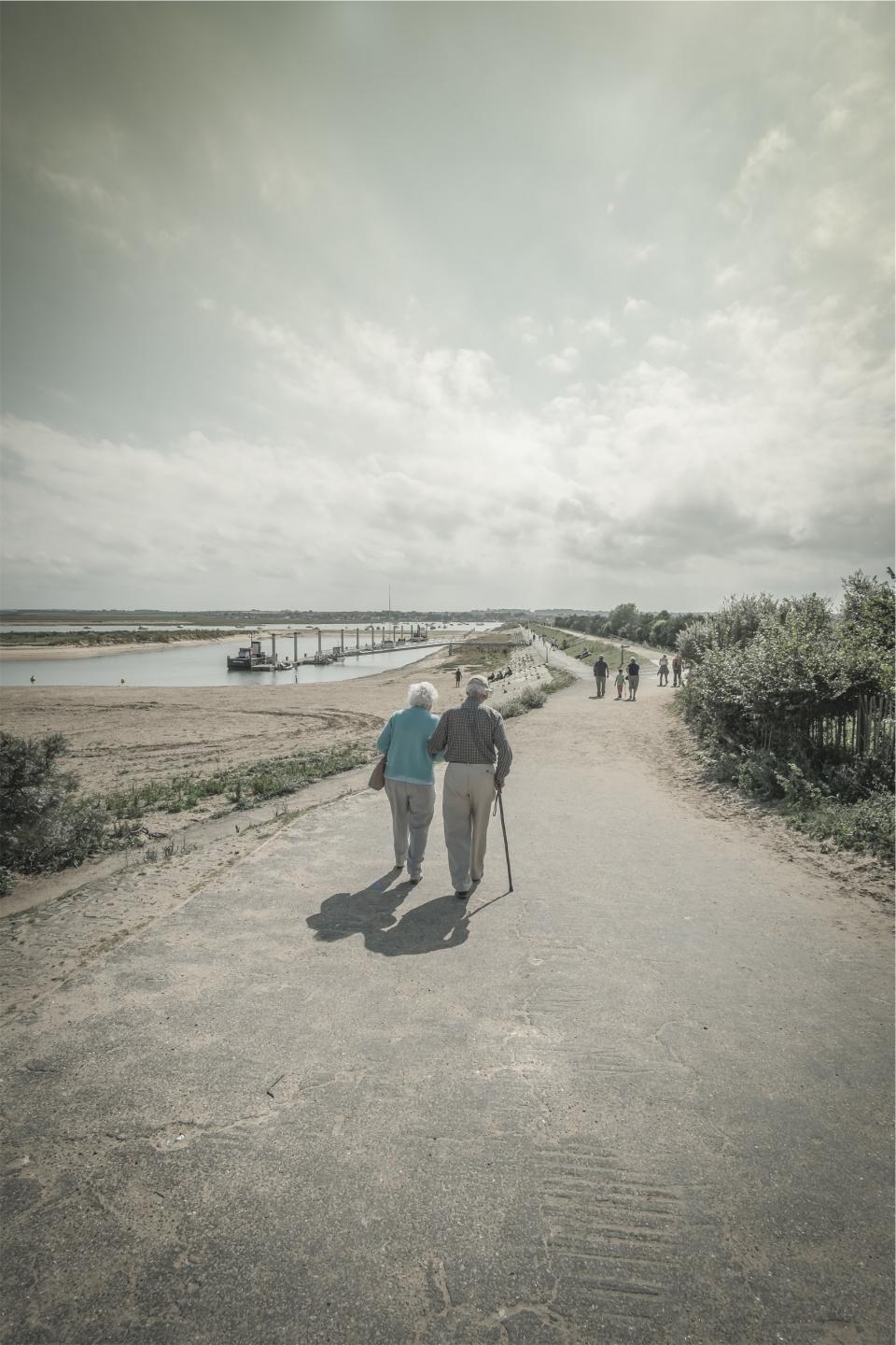 walking sunshine sunny people path old love elderly couple cane 