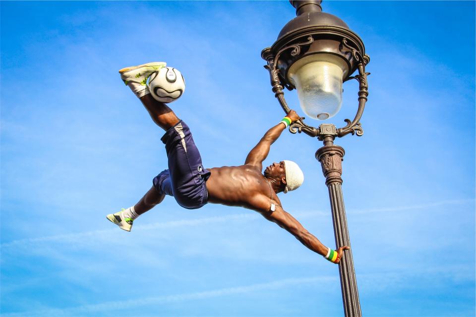 soccer sky shorts shoes Muscles man lamppost guy fitness blue ball athlete africanamerican 