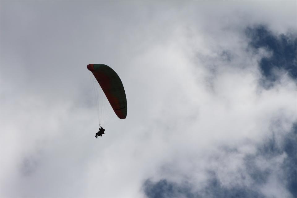 sky paragliding parachute clouds 