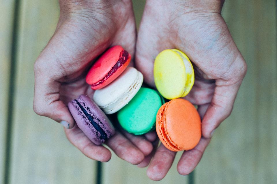 treats sweets snack macaroons hands food dessert Colours colors 