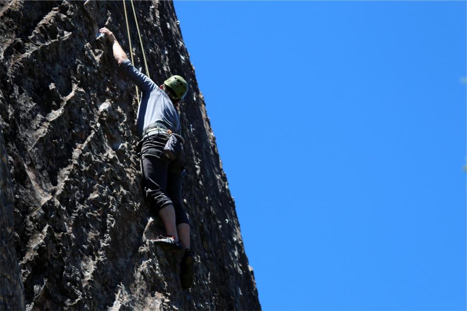 sports sky rockclimbing man helmet guy cliff blue 