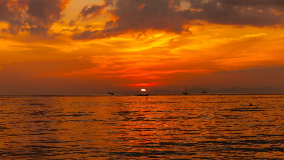 sunset sky ships sea ocean horizon dusk clouds boats 