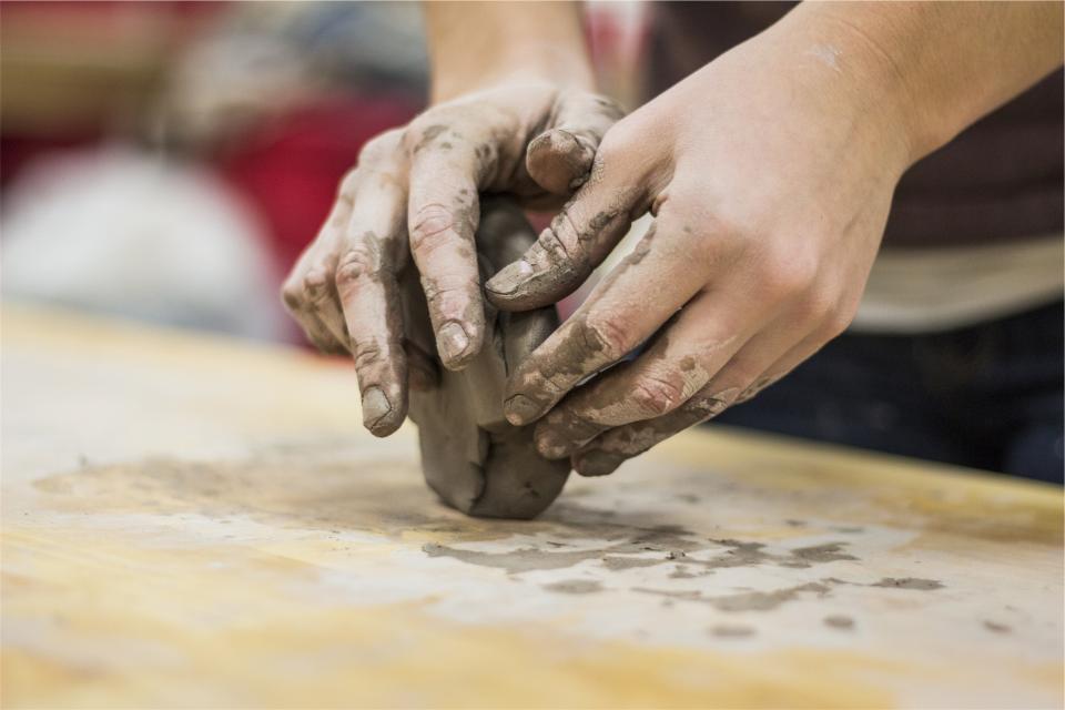 sculpting hands clay art 