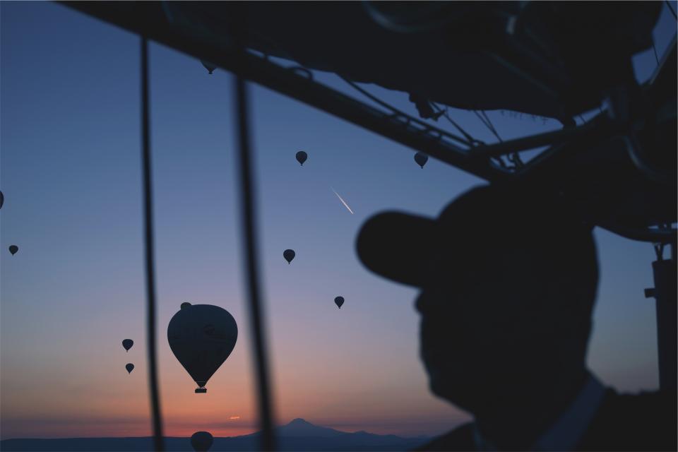 hot air balloons, sunset, dusk, sky, guy, man, hat, silhouette, shadows, night, evening