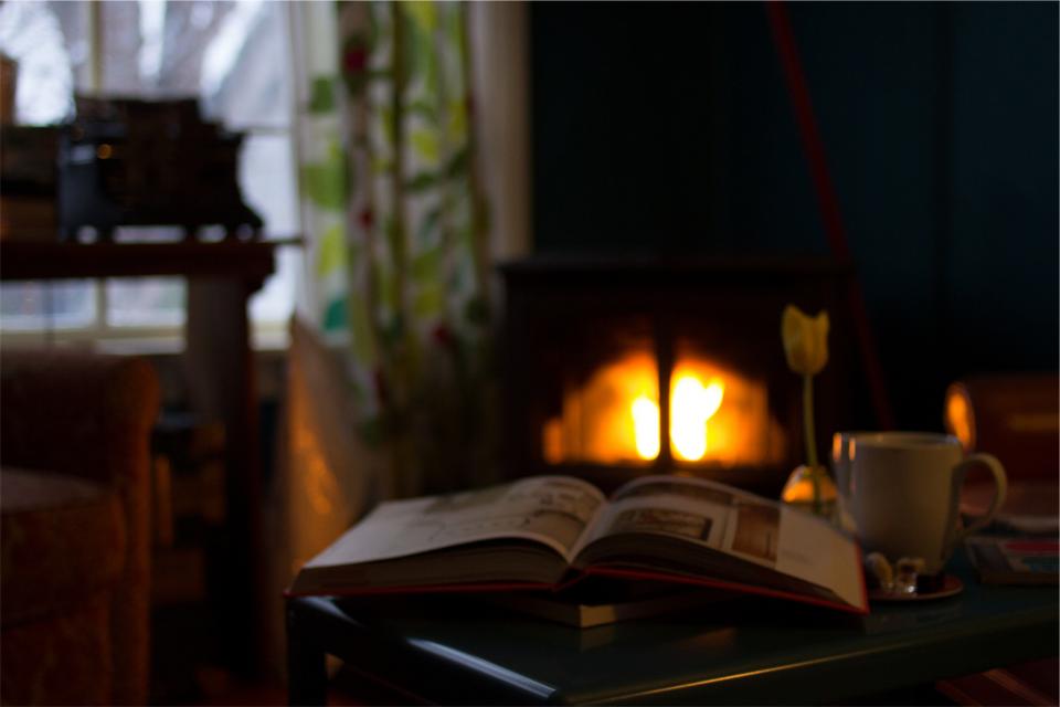 reading pages flame fireplace book 