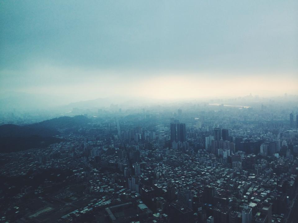 view urban towers sky highrises fog cloudy city buildings architecture aerial 