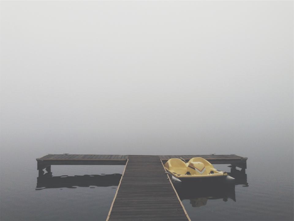 wood water pedalboat paddleboat lake grey fog dock cottage 