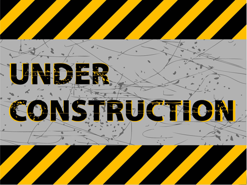 Under construction sign grunge background vector
